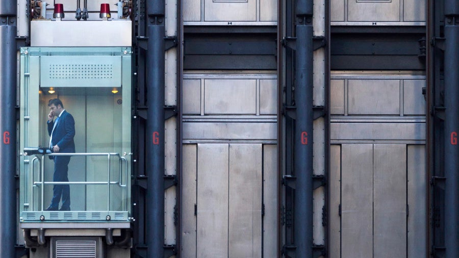 Office worker in a lift