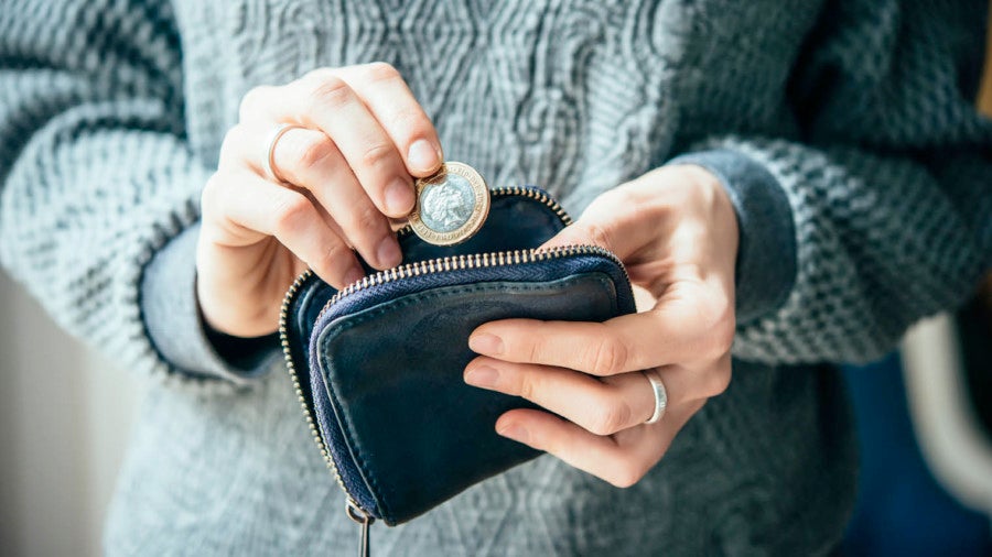 Woman with cash in purse