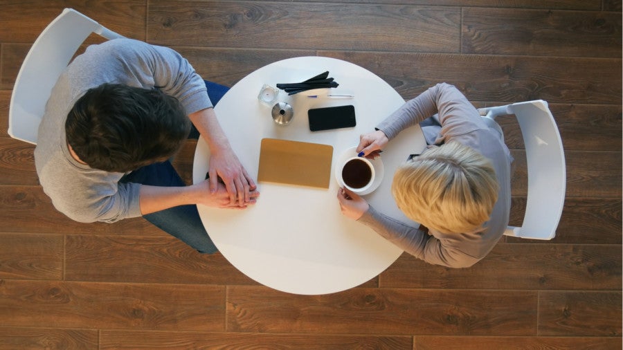 Man and woman having coffee