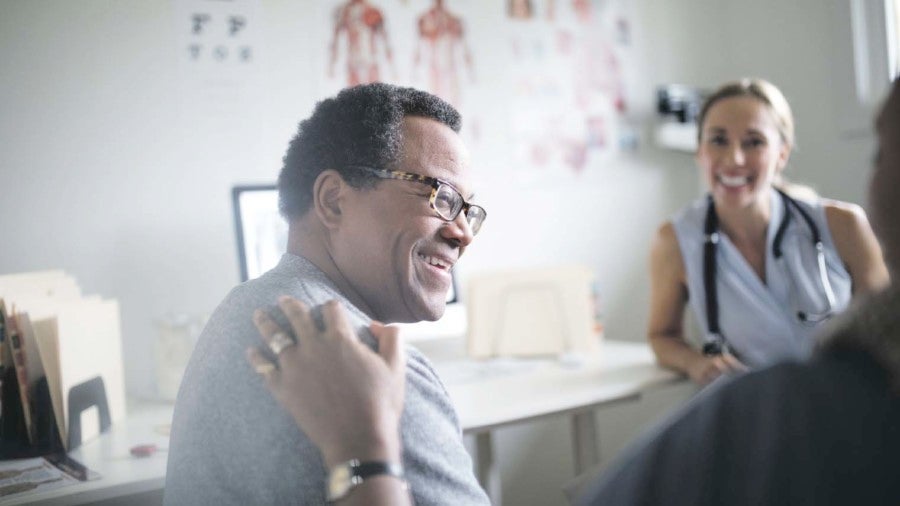 Happy patient with doctor