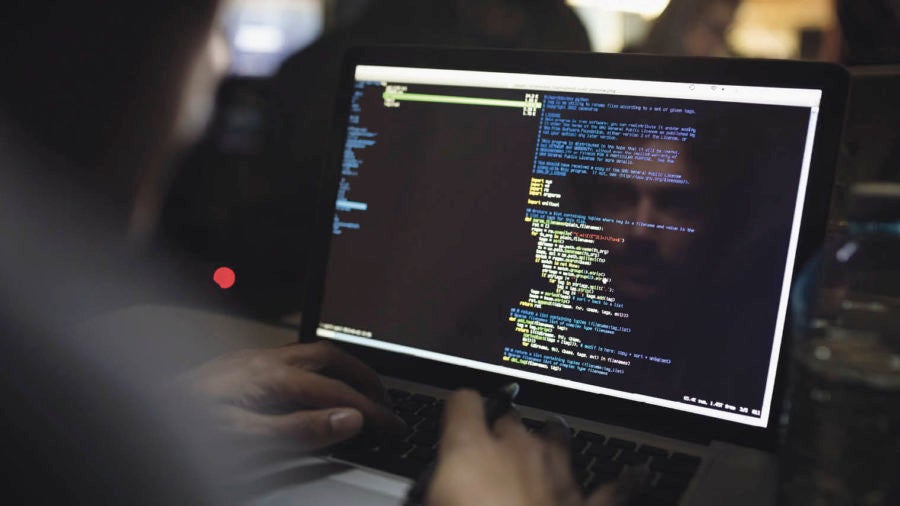 image of code on dark computer screen