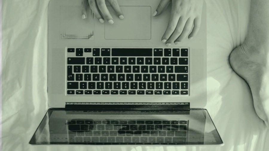 image of laptop from above, using online forum