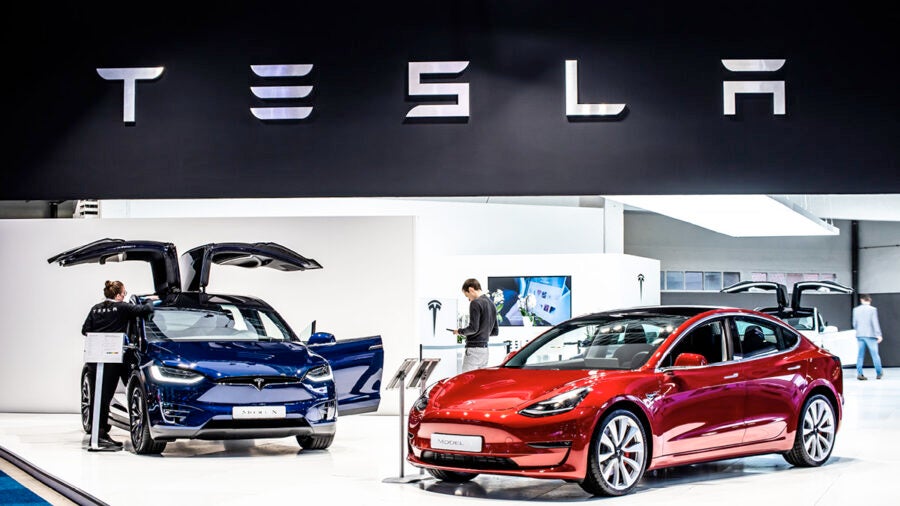 Under certain ESG standards, the ratings of fossil-fuel giant Exxon Mobil and electric car maker Tesla could well be the same