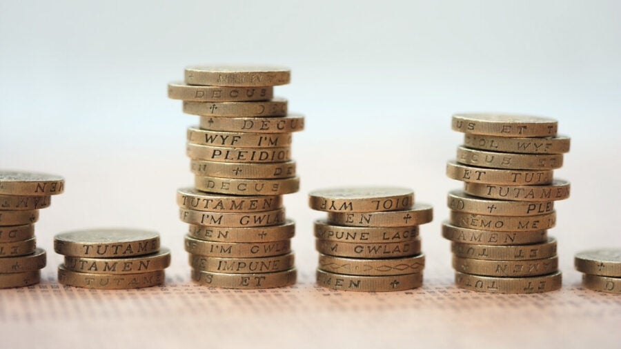 Uneven stacks of pound coins