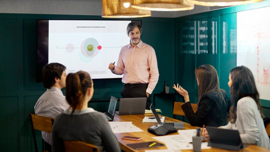 Business Executives Discussing During Meeting