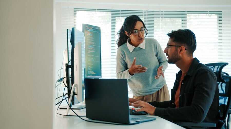 Latinx Software Developers In Intense Discussion